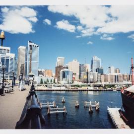 View across Cockle Bay towards Sydney city skyline from the Pyrmont Bridge Pyrmont, 1992