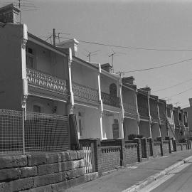 Row of terrace houses adjacent to Forest Lodge Public School, Charles Street Glebe, 1970s
